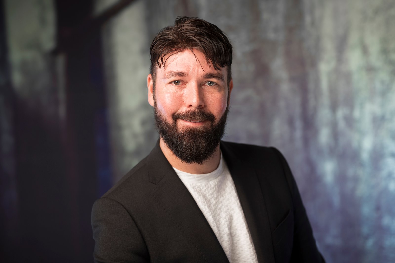 Dr Mark Hunn, CEO of NDIStress, headshot portrait